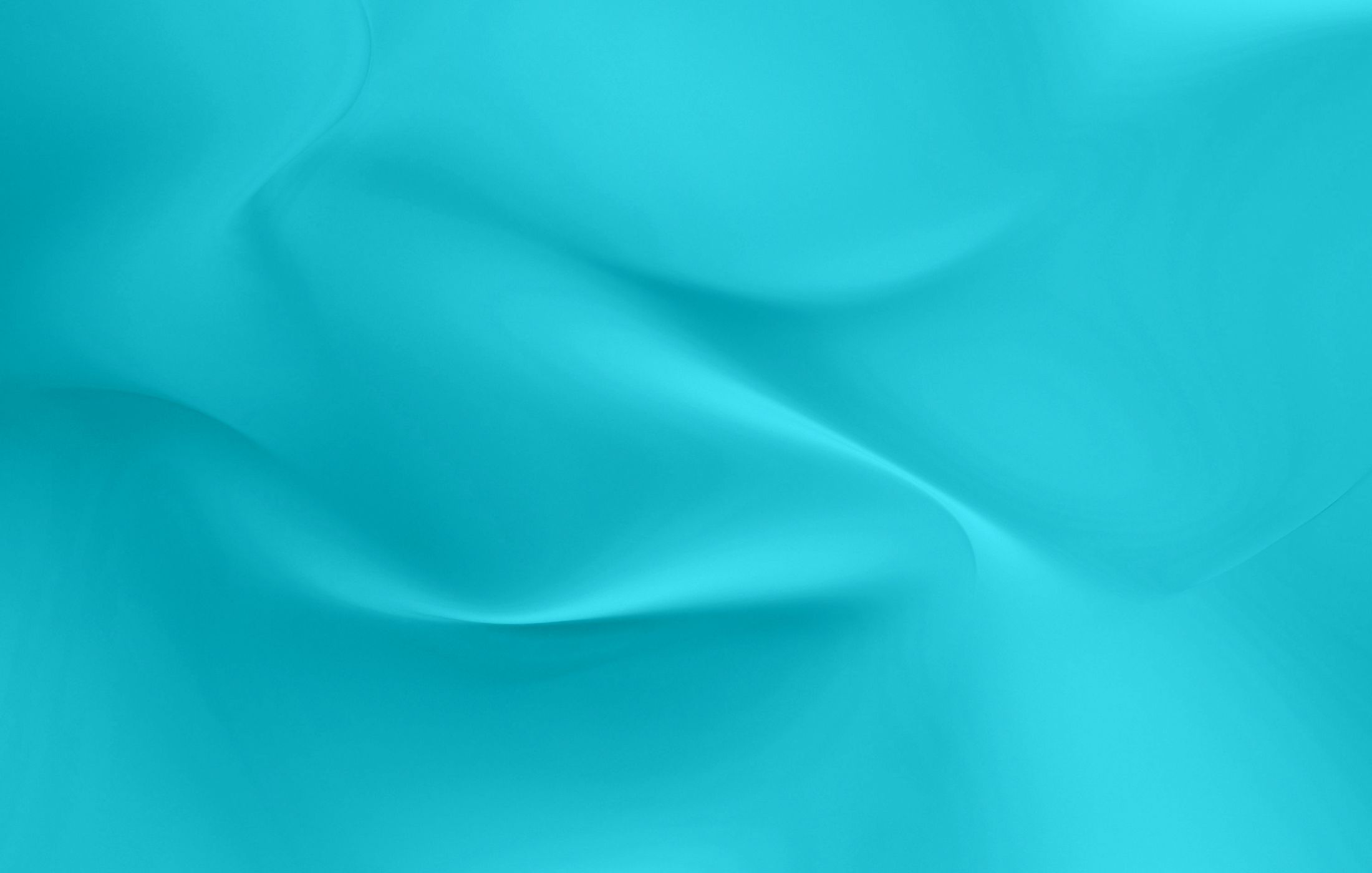 Abstract turquoise waves or fabric texture background.