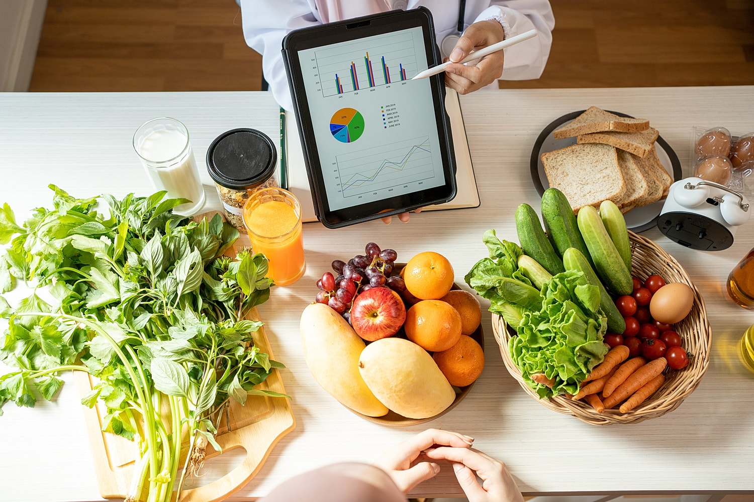 Healthy food choices with nutrition analysis on tablet.